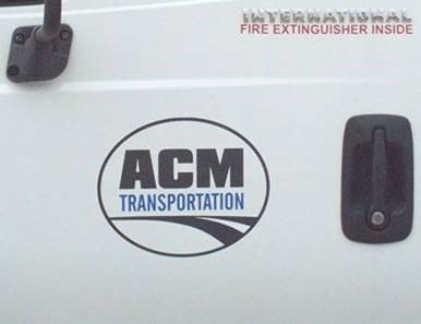 acm transportation logo on the door of a lard oil company truck